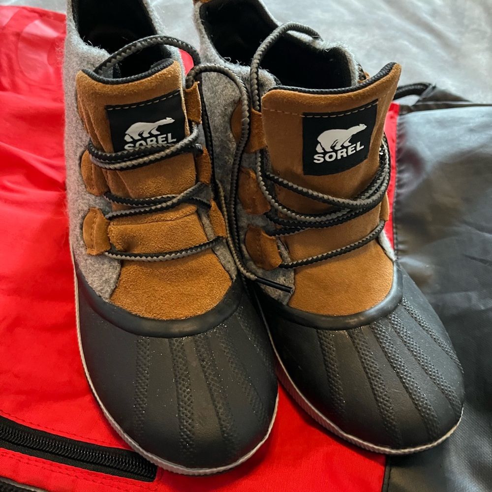 Sorel boots. Worn once. Bought the wrong size. I do not have the box.